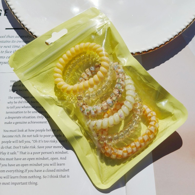 6個入りカラフルなレジン製ゼリースパイラルコイルヘアタイ、伸 - Silicone Band Women のレビューと価格